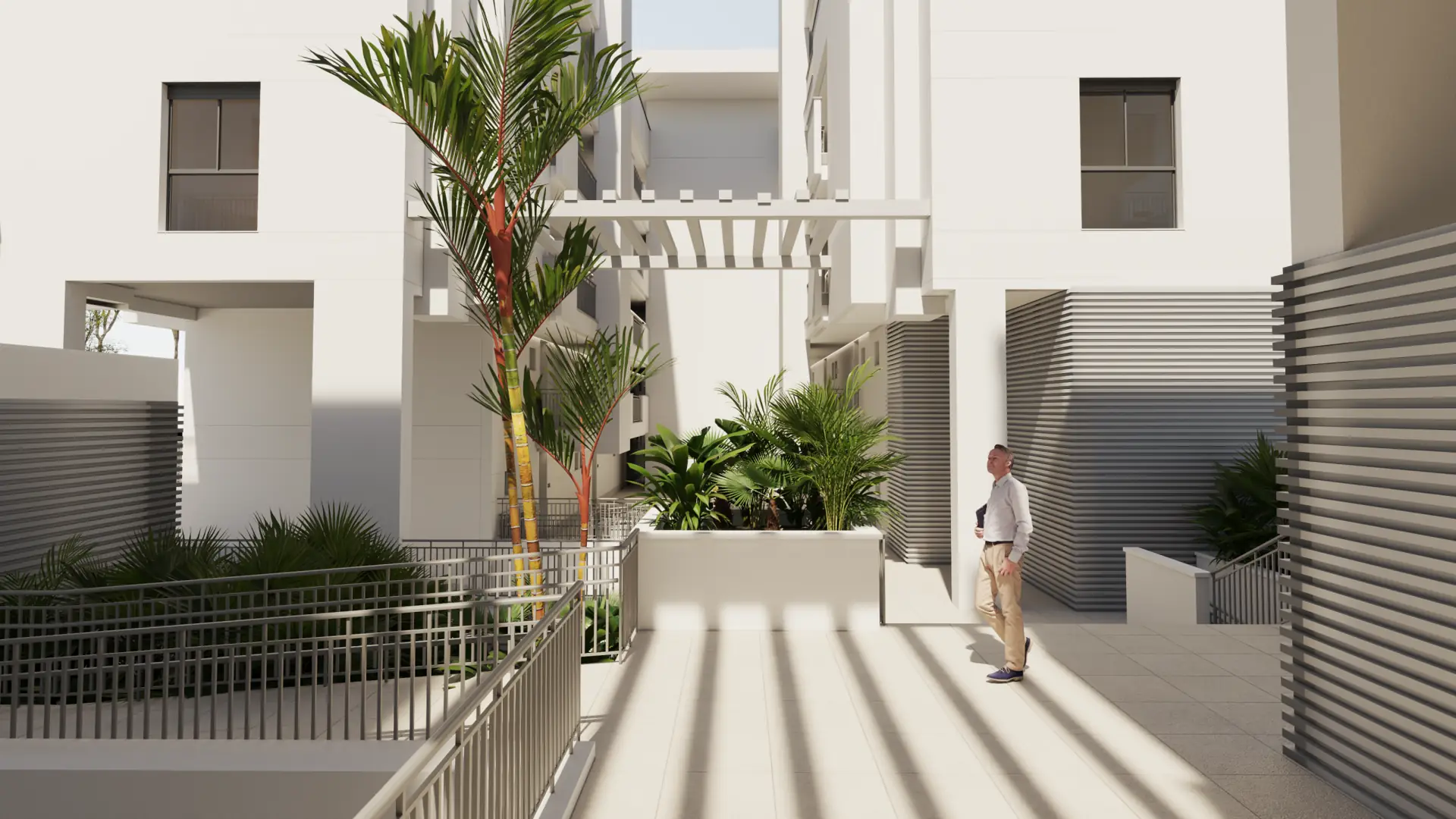 Recorrido peatonal en zonas comunes interiores de edificio moderno decorado con vegetación tropical